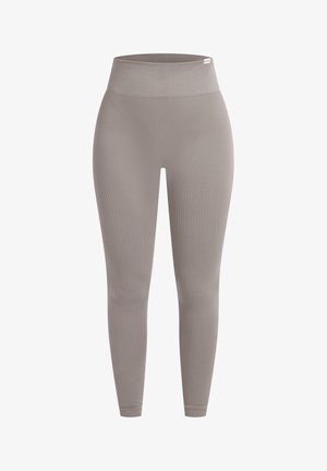 Rippige, hochtaillierte Leggings in einem sanften Taupe-Ton. Hergestellt aus dehnbarem Stoff, mit nahtlosem Design und figurbetontem Schnitt.