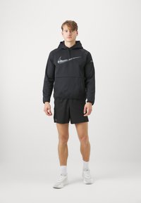 Nike Performance HOODIE - Jersey con capucha - black