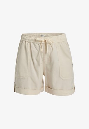 Beige cotton shorts with an elastic waistband, drawstring closure, side pockets, and rolled cuffs. Features Roxy logo on the side.