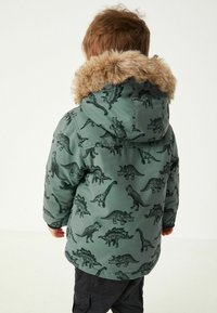 Next SHOWER RESISTANT - Jachetă de iarnă - sage green dinosaur