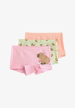 Kolme paria lasten puuvillaisia bokserialushousuja: vaaleanpunaiset, joissa on kapybara ja kukkia, vihreät kapybarakuviolla, sekä yksiväriset persikanväriset.