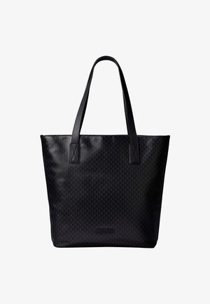 Musta kestokassi, jossa on kaksi pitkää kahvaa, hillitty geometrinen kuvio, suorakaiteen muoto ja pieni brändilappu alareunan keskellä.