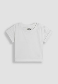 Wit katoenen T-shirt met korte mouwen, ronde halslijn en twee drukknoopaccenten op de schouder. Gladde textuur, casual pasvorm.