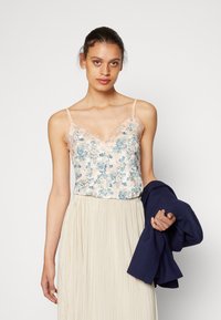 Rosemunde STRAP - Top - peach abstract rose