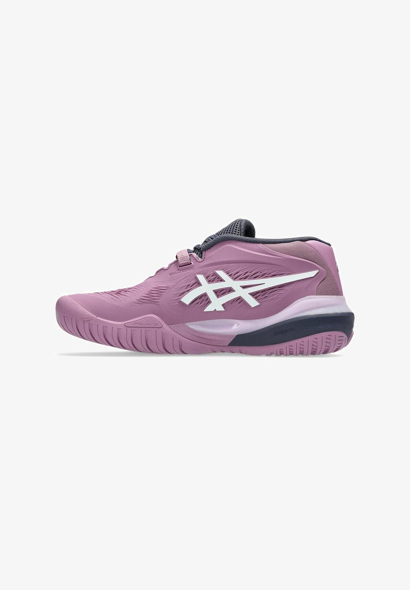 Pink athletic shoe featuring a textured upper, white logo accents, and a rubber sole with a darker heel section for stability.
