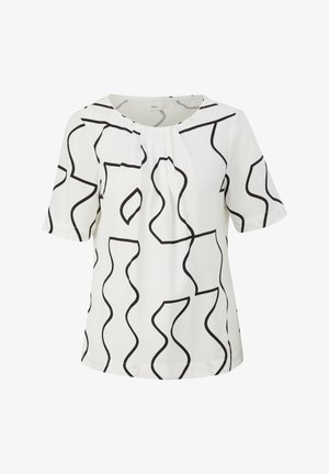 Weiße Bluse mit kurzen Ärmeln, die mit abstrakten schwarzen Wellenlinien verziert ist, runder Ausschnitt und geraffte Details an der Vorderseite. Leichter Stoff.