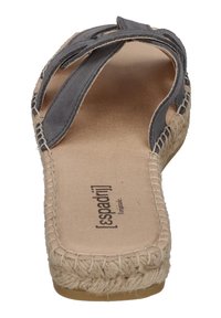 Gray suede espadrille sandals with a woven jute sole, showing a flat design and open toe, featuring a stitched edge and logo on the insole.