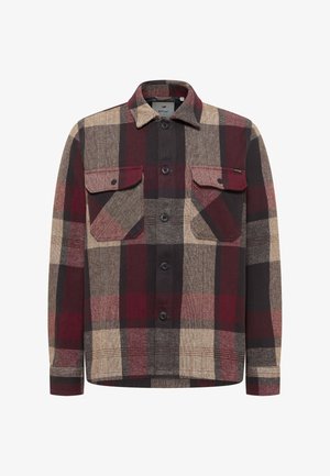 Koszula flanelowa w kratę w kolorach brązowym, bordowym i beżowym. Z kołnierzykiem, zapięciem na guziki oraz dwoma przednimi kieszeniami z patkami. Tkanina o fakturze.