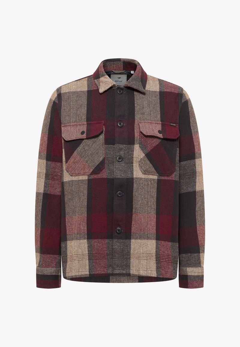Koszula flanelowa w kratę w kolorach brązowym, bordowym i beżowym. Z kołnierzykiem, zapięciem na guziki oraz dwoma przednimi kieszeniami z patkami. Tkanina o fakturze.