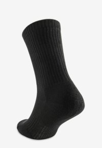 Schwarz gerippte Socke mit verstärktem Fersen- und Zehenbereich, glatter Textur und einem Design in mittlerer Höhe bis zur Wade. Robustes Material für Komfort und Passform.