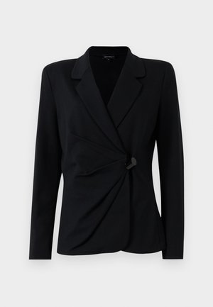 Black, tailored blazer with long sleeves, featuring a notched collar, draped front design, and a single black button closure. Made of smooth fabric.