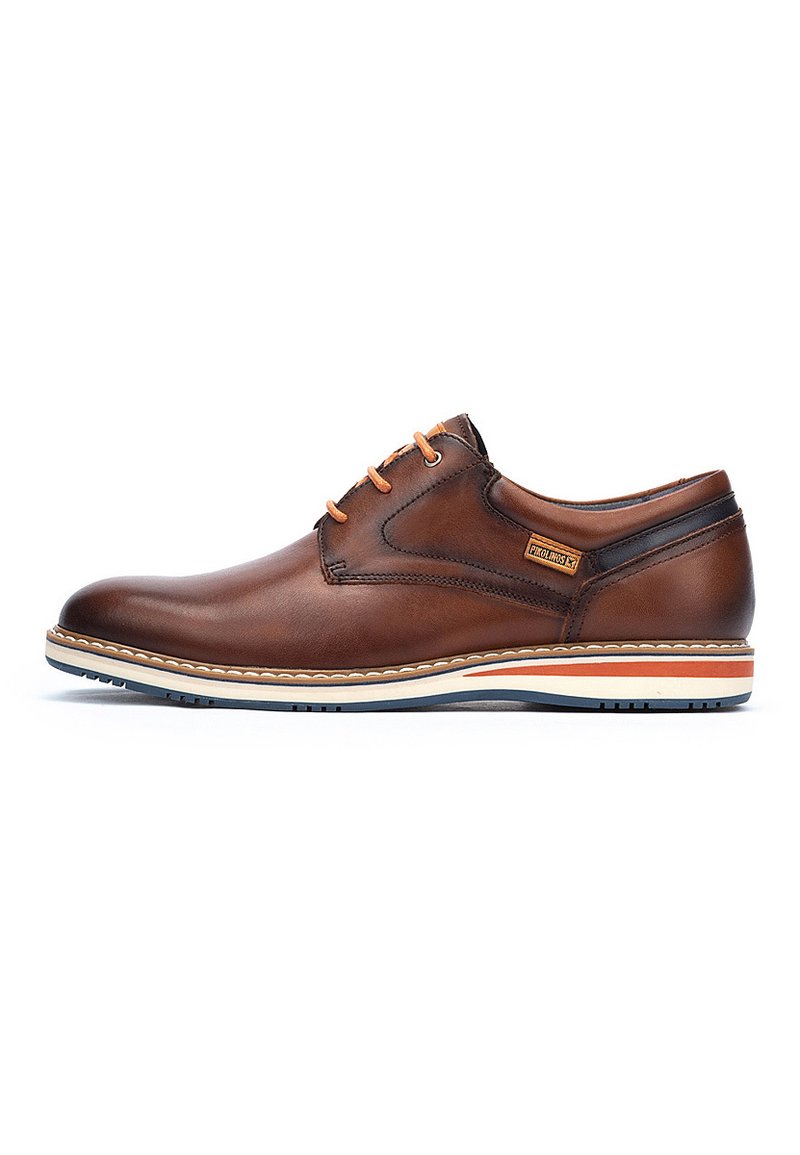 Brown leather shoe with a rounded toe, contrasting orange laces, and a white sole featuring subtle orange and blue accents.