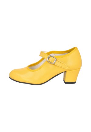 Zapato Mary Jane amarillo con tacón bajo de bloque y correa con hebilla plateada, mostrado de perfil sobre fondo blanco.