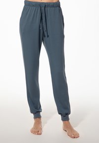 Losse, geknoopte joggers in een zachte blauwe katoenmix, met een elastische tailleband met trekkoord en zijzakken.