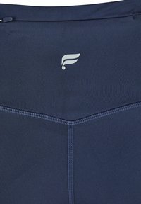 Navy blue athletic leggings featuring a smooth, stretchy fabric, a high waistband, and a small white logo on the back.