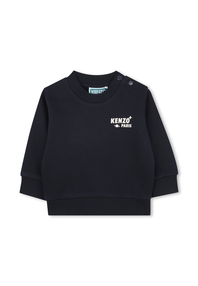 Felpa navy blue a maniche lunghe con polsini e colletto a coste. Presenta il logo stampato "KENZO PARIS" e due bottoni a pressione sulla spalla sinistra.