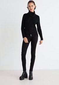 ONLY ONLKATIA SADDLE ROLL NECK - Maglione - black