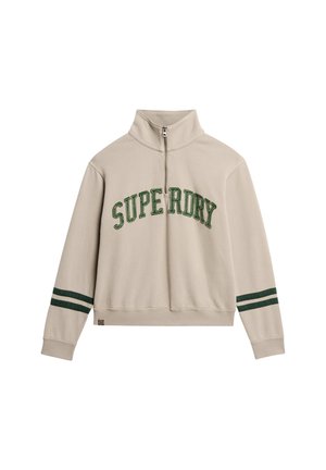 Hellbeige Zip-Up-Sweatshirt mit grüner "SUPERDRY" -Schrift, hohem Kragen und grünen Streifenakzenten an den Ärmeln. Weicher Stoff.