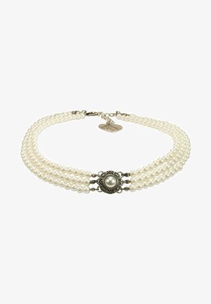 Three-strand necklace featuring white pearls, a central silver-tone clasp with an intricate design and a pearl accent, finished with a heart charm.