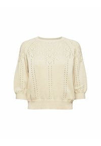 Pull en tricot crème avec manches trois-quarts bouffantes et motifs ajourés décoratifs sur le devant et les manches.
