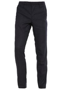 Mörkblå rutig byxor med en slim passform. Tillverkade av mjukt tyg, med standardfickor och en klassisk midja.