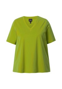 T-shirt a maniche corte con scollo a V in cotone verde brillante. Vestibilità ampia con una texture liscia e senza modelli o dettagli visibili.