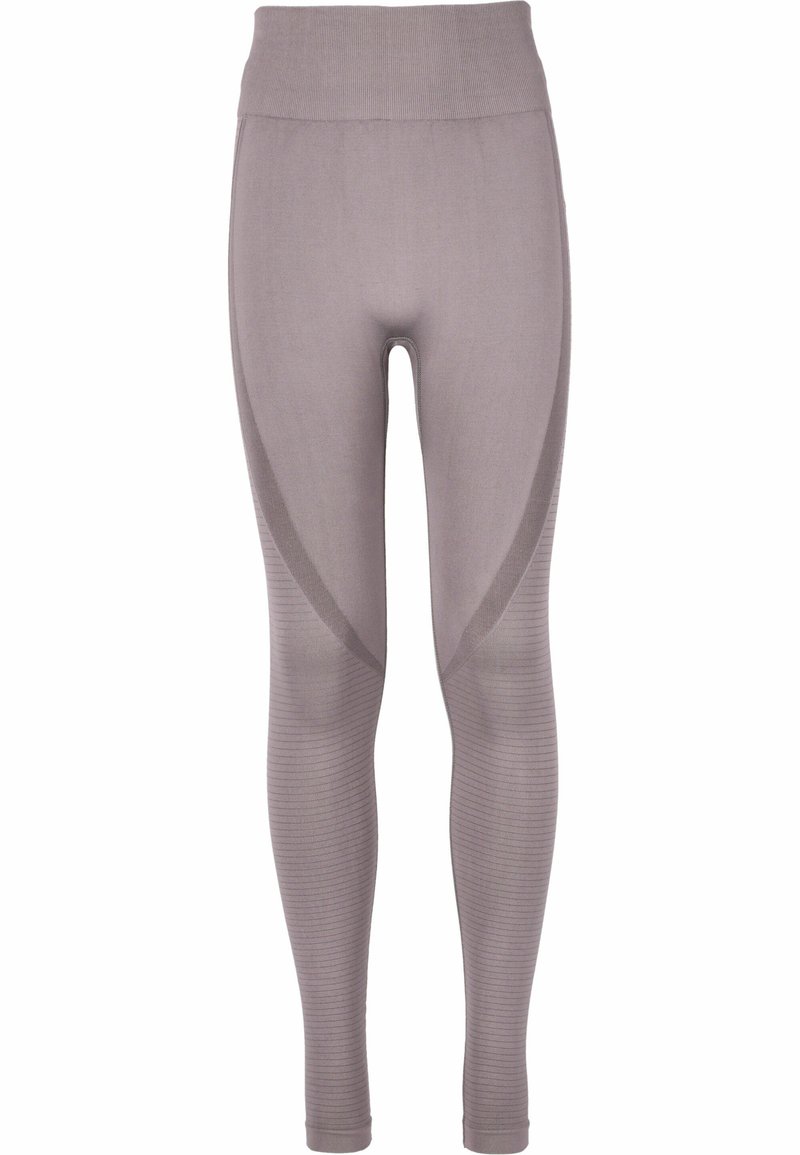 Lys grå leggings med høj talje, der har en ribbet tekstur og kontrasterende glatte sidelommer. Pasformen er tætsiddende og tapered.