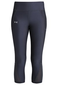 Navy blue capri leggings valmistettu joustavasta materiaalista, jossa on leveä vyötärö ja verkkomaiset paneelit sivuilla. Huomaamaton logo yksityiskohta.