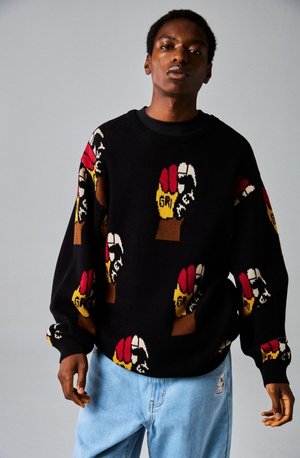 Suéter negro de punto con un patrón gráfico colorido de manos con guantes de diferentes colores. Corte holgado con un cuello y puños acanalados.