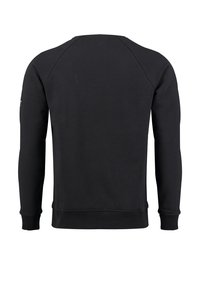 Sudadera negra hecha de una tela suave con cuello redondo, mangas raglán, puños y dobladillo de canalé. Textura lisa sin patrones o logotipos visibles.