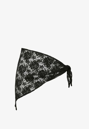 Foulard triangulaire en dentelle noire à motif floral, noué à un coin sur fond blanc.