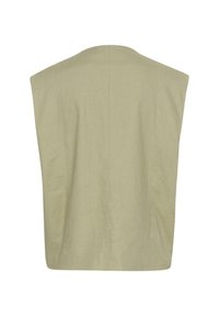 Linen veste gaišzaļā krāsā ar brīvu piegriezumu, plašām plecu daļām un vienmērīgu aizmuguri bez redzamām pārlūkām vai rotājumiem.