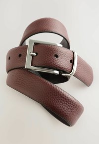 Burgundy leather belt with a textured finish, featuring a silver rectangular buckle, multiple holes for adjustment, and a smooth underside.