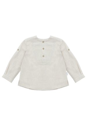 Camisa de manga larga beige claro con tres botones delanteros, lengüeta con botón en cada manga y dobladillo redondeado, colocada plana sobre un fondo blanco.