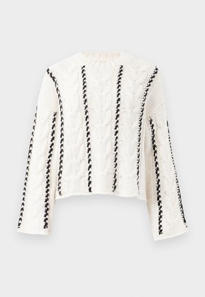 Suéter de malha canelada em creme com detalhes verticais pretos, apresentando um decote redondo e mangas longas; material de algodão texturizado.