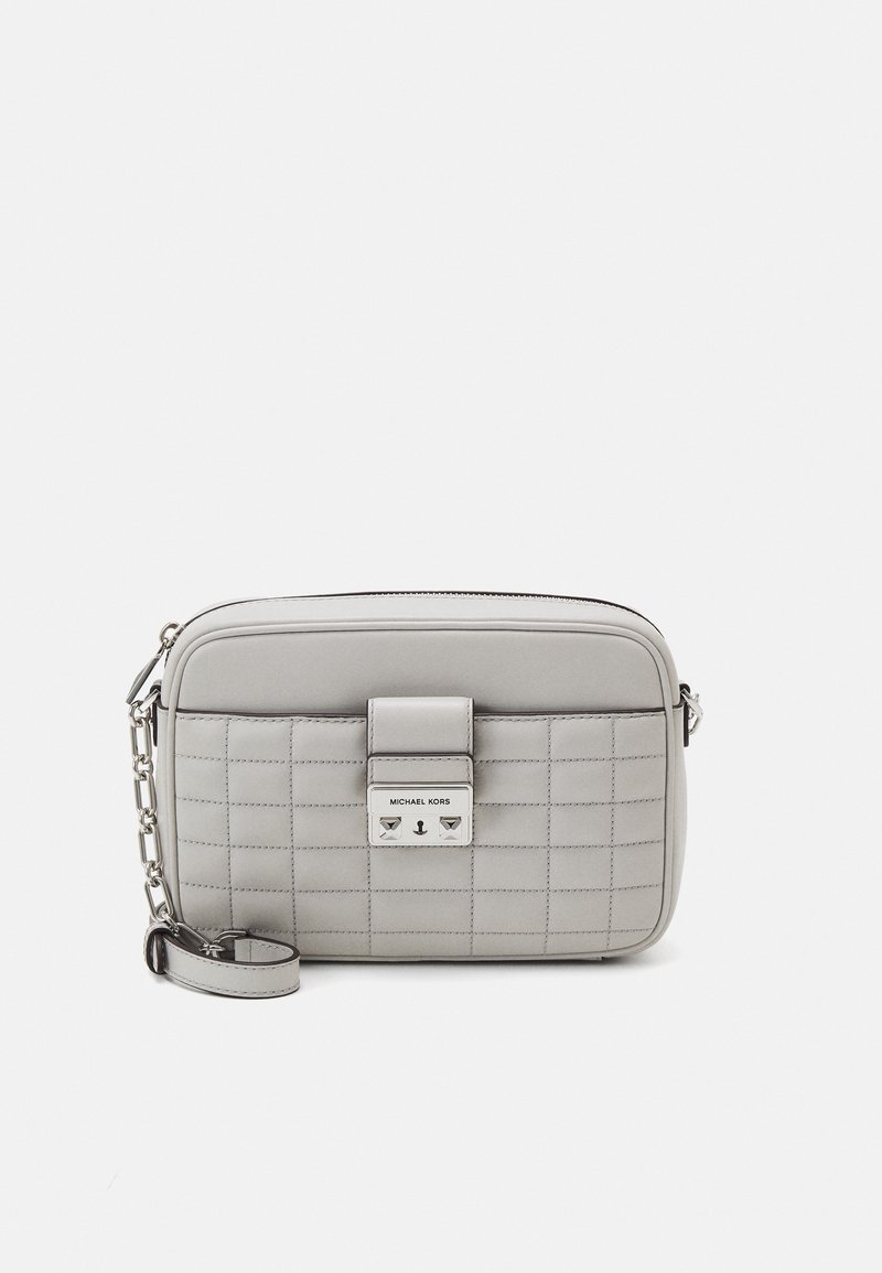 Gray quilted crossbody bag with silver hardware, flat front, top zipper, and adjustable chain strap. Features a rectangular shape and sleek design.