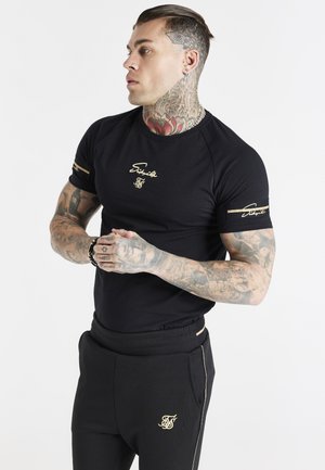 EXPOSED TAPE RAGLAN GYM TEE - T-shirt - bas - black