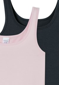 Two tank tops stacked; one in soft pink, the other in dark gray. Both feature thin straps and smooth cotton fabric. Tags visible.