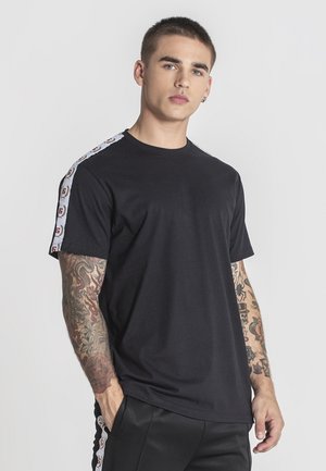 Gianni Kavanagh RETRO TAPE - Camiseta estampada - black