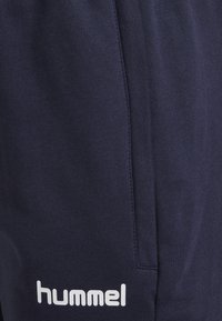 Hummel HMLGO - Pantalones deportivos - marine