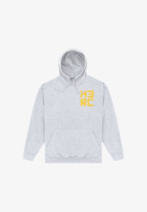Sweat à capuche gris clair avec poche frontale et texte en bloc jaune "HERO" sur la partie supérieure gauche de la poitrine.