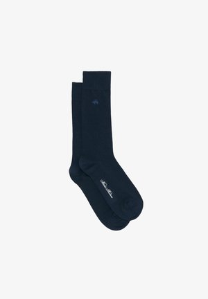 Navyblaue Socken aus weichem Baumwollmischgewebe, mit einem gerippten Bund und einem kleinen gestickten Logo. Glatte Textur mit klassischem Design.