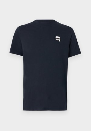 Navy blue cotton t-shirt with short sleeves, crew neck, and a small white graphic of a person with sunglasses on the chest.