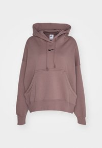 Nike-huppari pehmeästä, hillityn mauvun sävyisestä kankaasta; siinä on etutasku, säädettävä huppu ja rinnan musta kirjailtu logo.