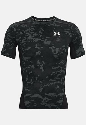 Camiseta de compresión Under Armour HeatGear para hombre en negro y gris oscuro con patrón de camuflaje digital y mangas cortas.