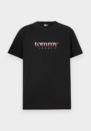 Crna pamučna majica s bijelim i crvenim "tommy JEANS" logom u središtu. Kratki rukavi, okrugli izrez i standardna kroj.