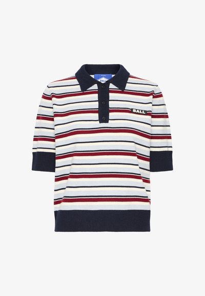 Polo à manches courtes couleur crème, avec des rayures horizontales bleu marine, rouge et jaune. Présente un col et une patte de boutonnage bleu marine avec trois boutons noirs.