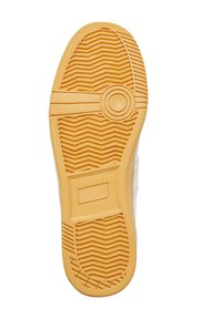 Podešev z gumy s texturovaným vzorem; převážně žlutá s jemnými drážkami, kruhovými akcenty a vyvýšenou obdélníkovou částí.
