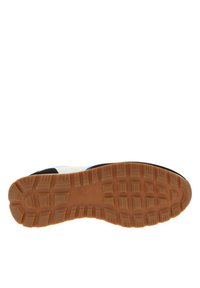 Semelle de chaussure de sport avec une surface en caoutchouc texturé, présentant un motif de semelle en carrés et rectangles ; les couleurs dominantes sont le marron et le noir.