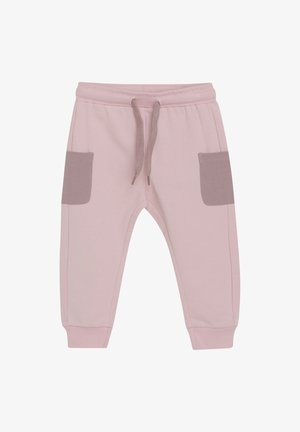 Roze katoenen joggingbroek met een trekkoord in de taille, ribbelmanchetten en twee contrasterende lichtbruine zijzakken. Glad oppervlak, casual ontwerp.